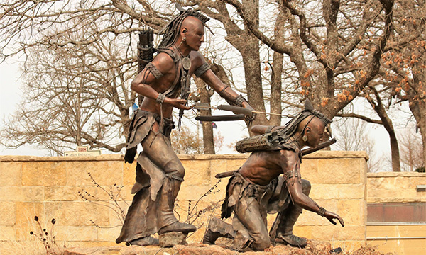 Two Chickasaw Warriors Sculptures by Sheila Brown