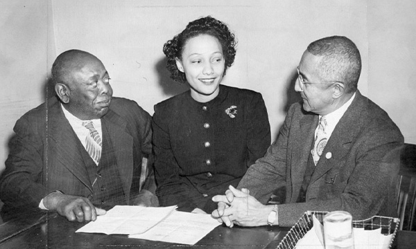 January 14, 1946: Fisher applies for admission to the OU College of Law. Accompanying her were NAACP Regional Director Dr. W.A.J. Bullock and Oklahoma NAACP leader/editor of the Black Dispatch Roscoe Dunjee. Source: OU College of Law